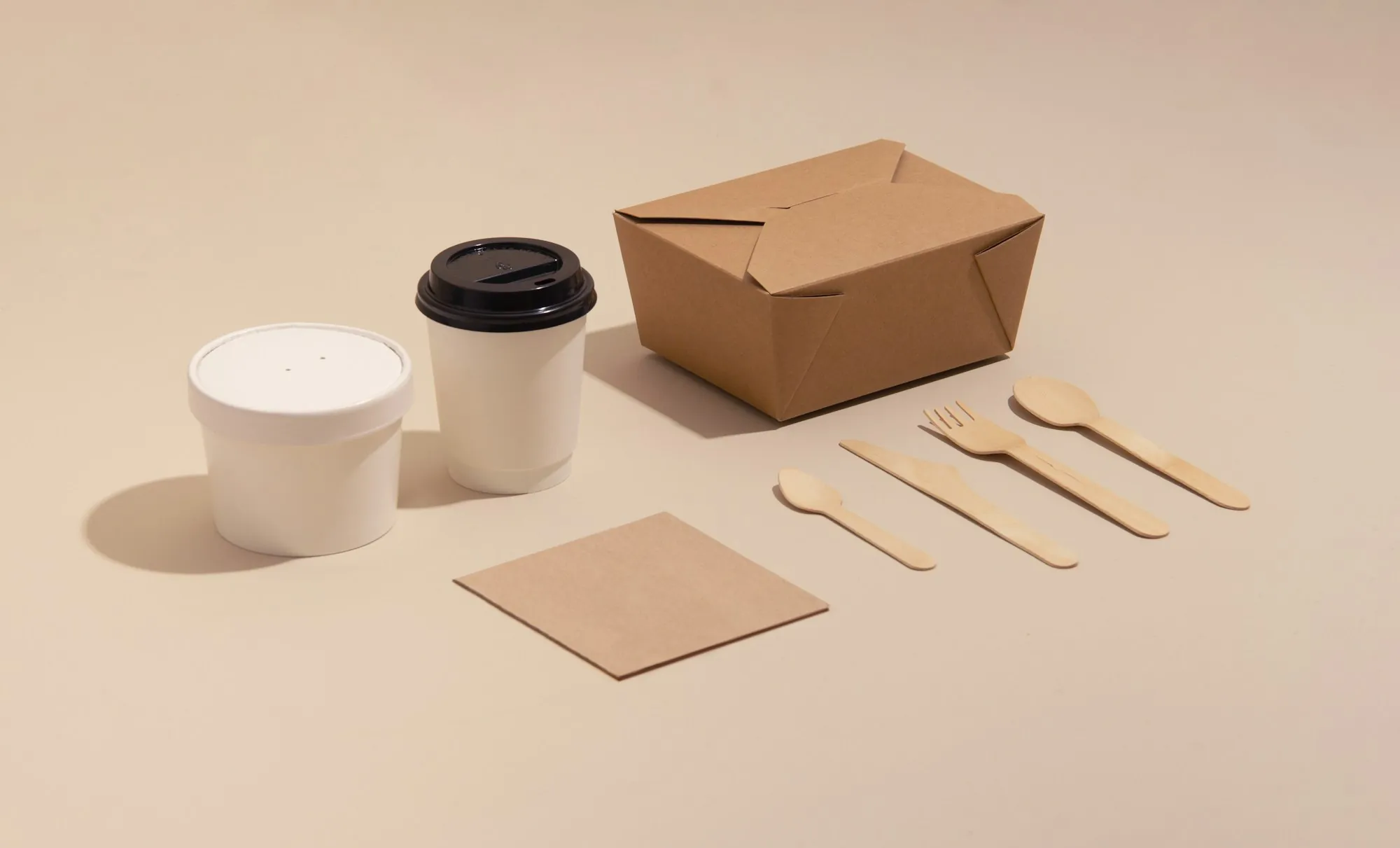 Kraft fold-top to-go box, soup cup, coffee cup and wooden cutlery