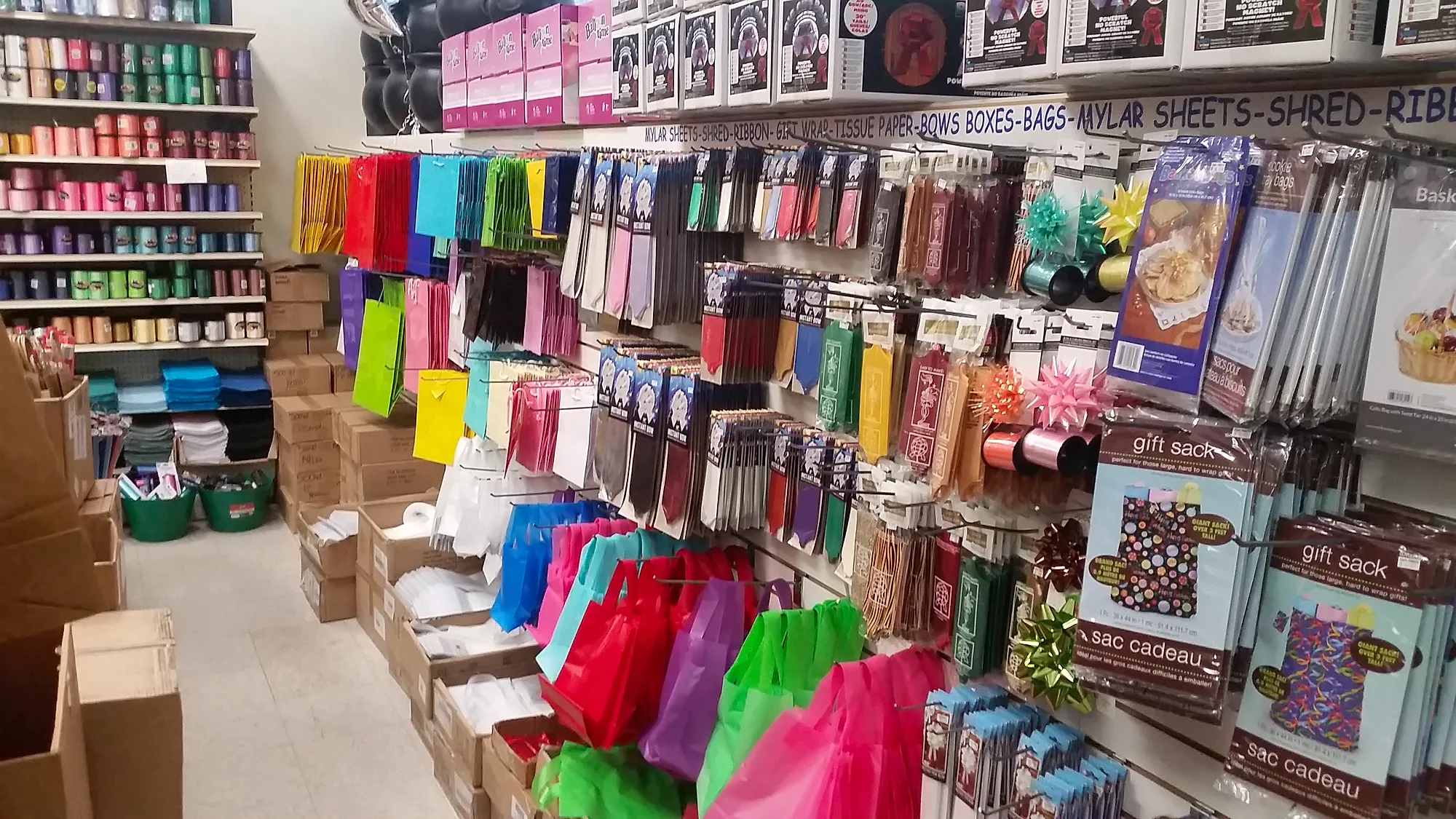 Capt. Party aisle of gift bags, tissue paper and bows